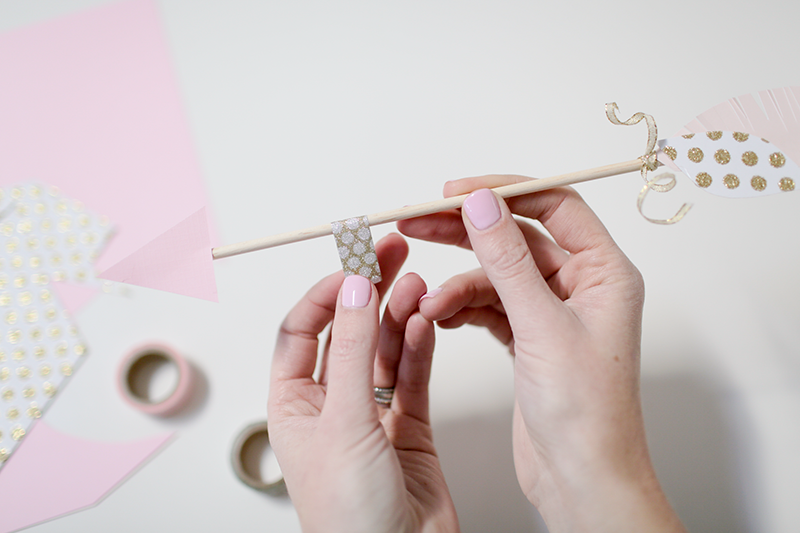 Getting crafty and creating fun and easy DIY Galentine's or Valentine's Day arrow party decorations for cheap with Copy Cat Chic.