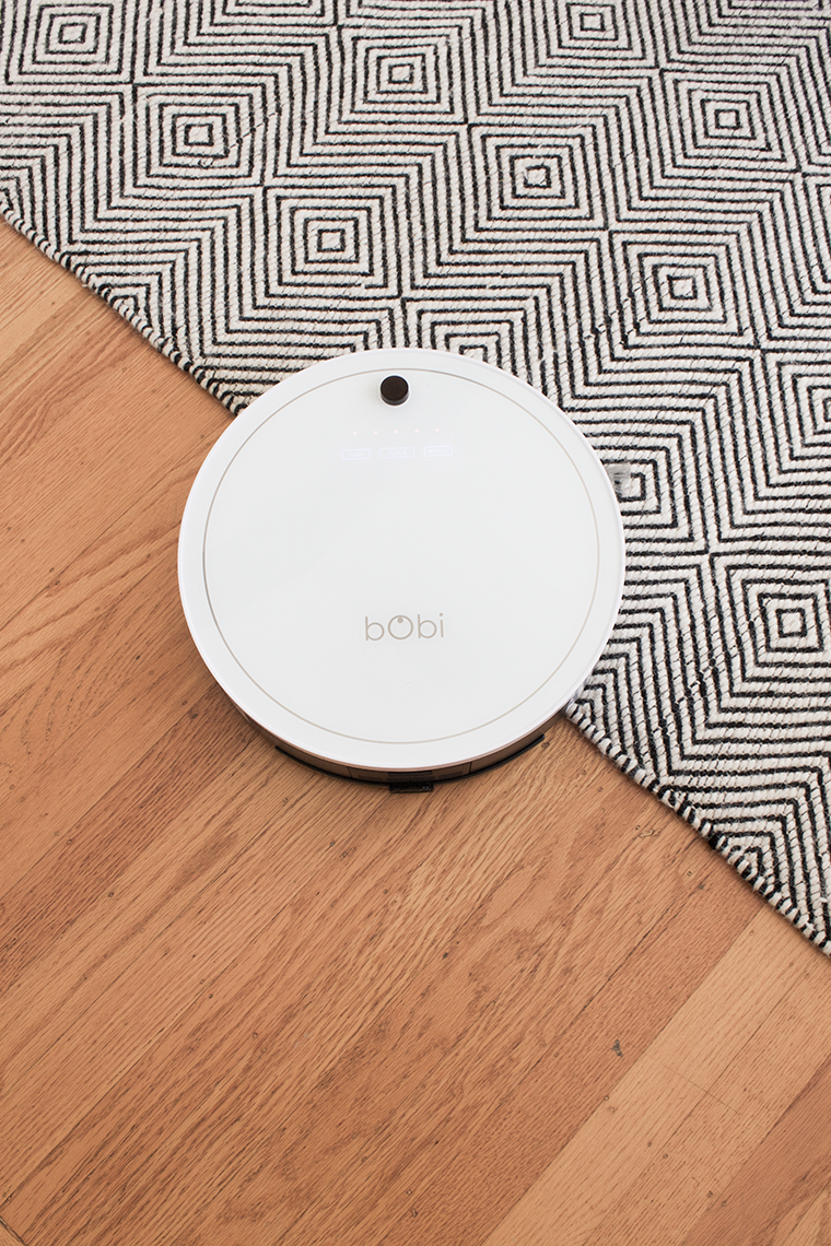 Reviewing the BobSweep bObi Classic Robotic Vacuum: It sweeps, vacuums, sterilizes, has a HEPA filter and MOPS all at the same time. @copycatchic cleaning