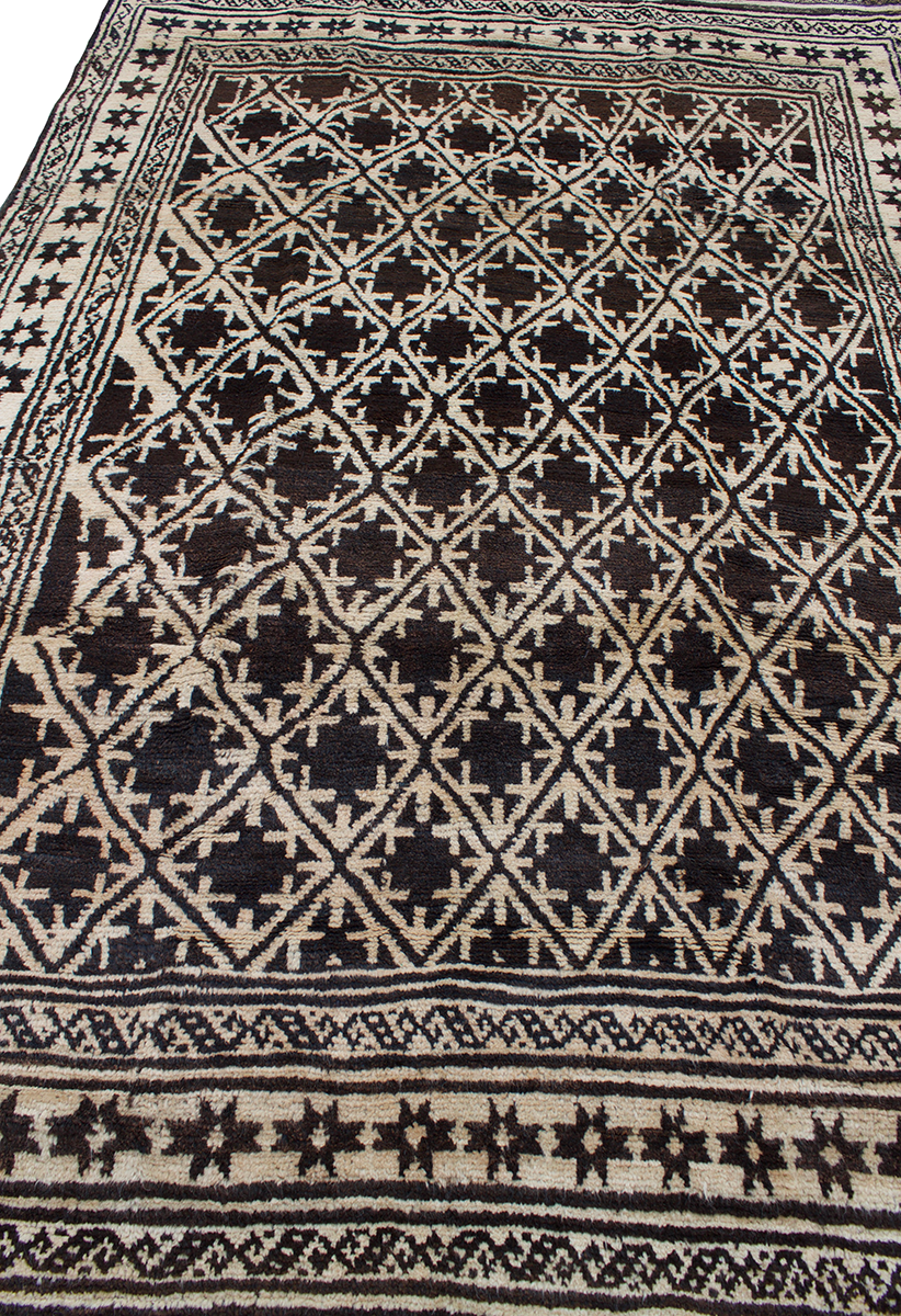 Copycatchic Daniels Rug vintage afghan tribal woven undyed wool rug in ivory, brown and black.