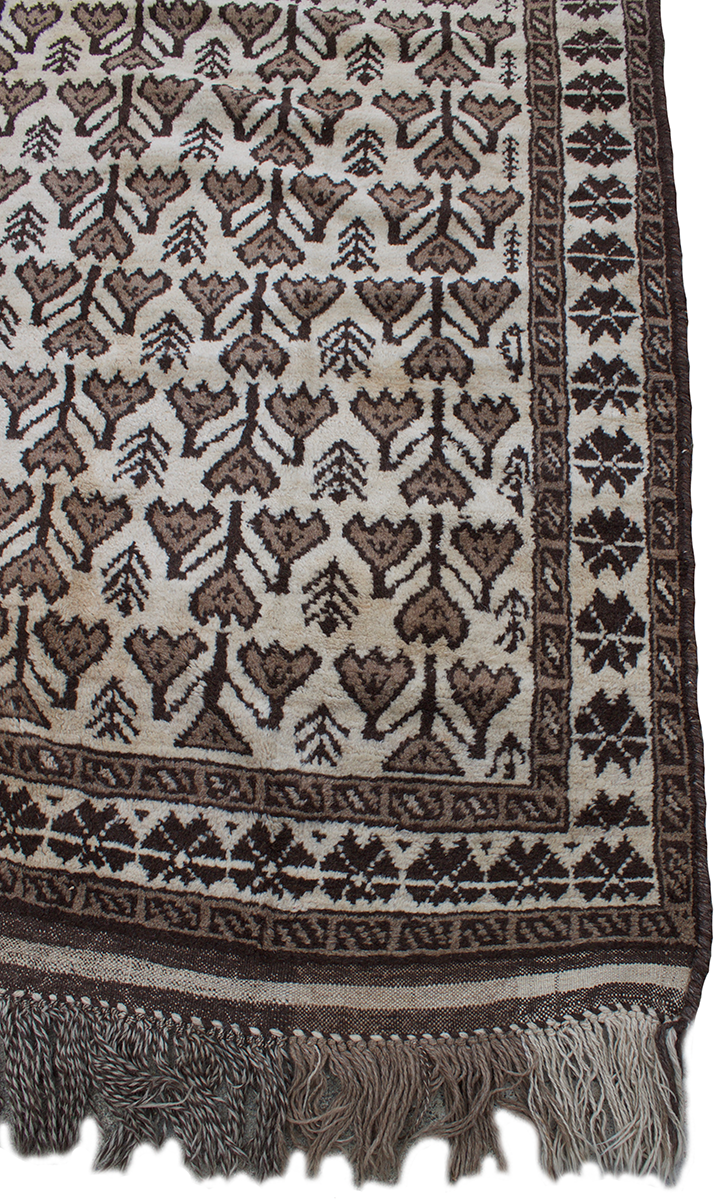 Copycatchic Emerson Rug vintage afghan tribal woven undyed wool rug in ivory, brown and black.