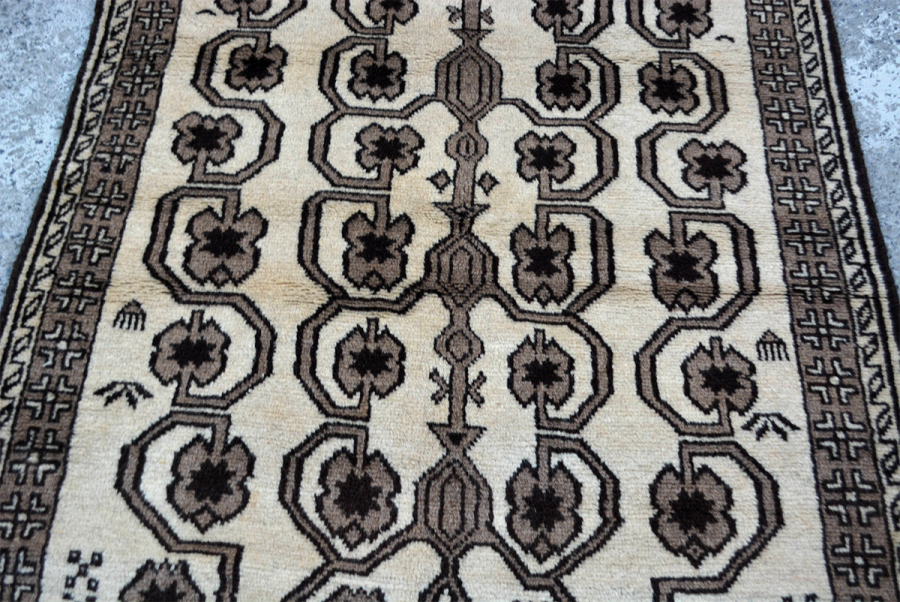 Copycatchic Irving Rug vintage afghan undyed wool rug in ivory, brown and black.