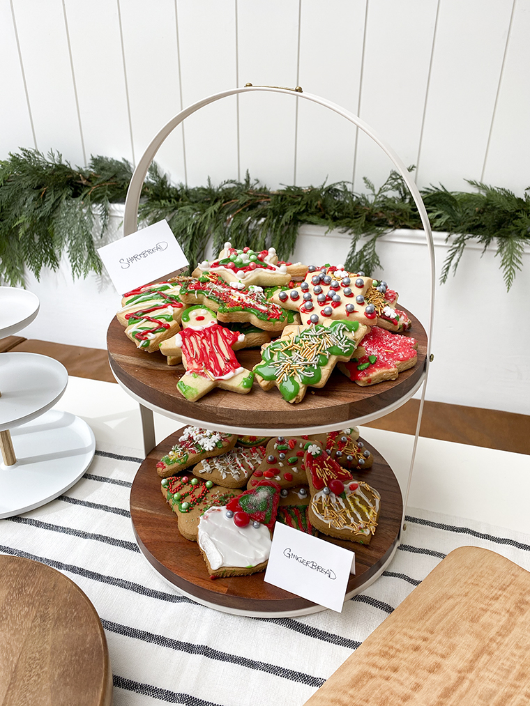 6 easy tips for a successful, simple, seasonal Christmas Cookie Exchange party with World Market and copycatchic. Simple, clean and easy holiday party decor and entertaining set up for a modern cookie exchange table using things you already own added with festive, seasonal touches. copycatchic luxe living for less budget home decor, easy entertaining, budget travel, home trends and design daily finds and room redos